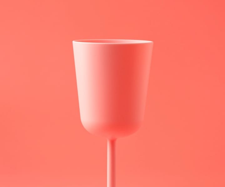 pink wine cup with pink background